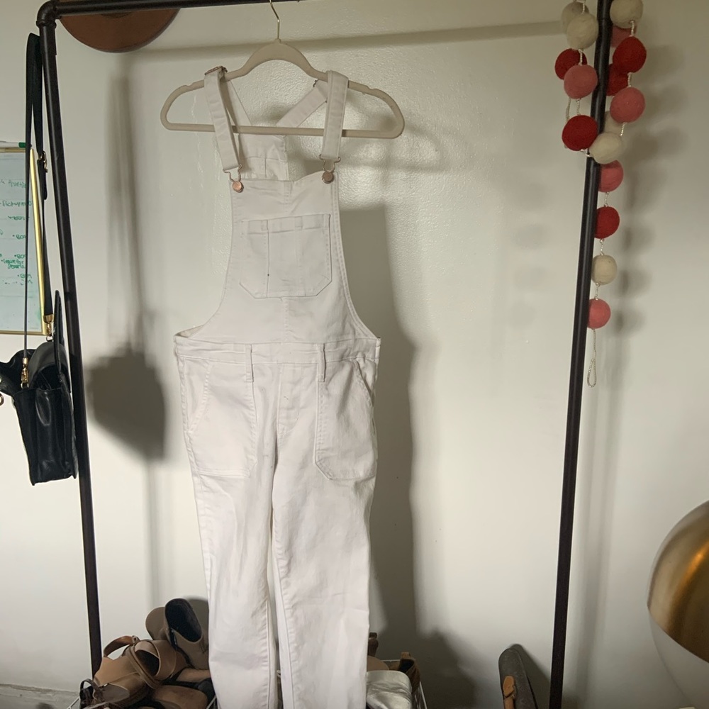 All white overalls with rose gold clips